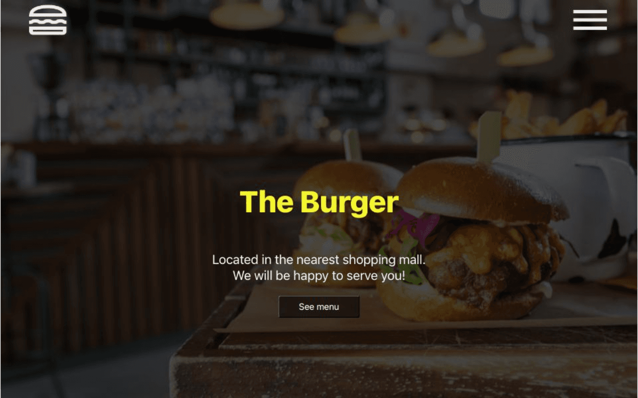Image of the homepage of 'The Burger' website showing a fictional burger joint with a banner and navigation elements.